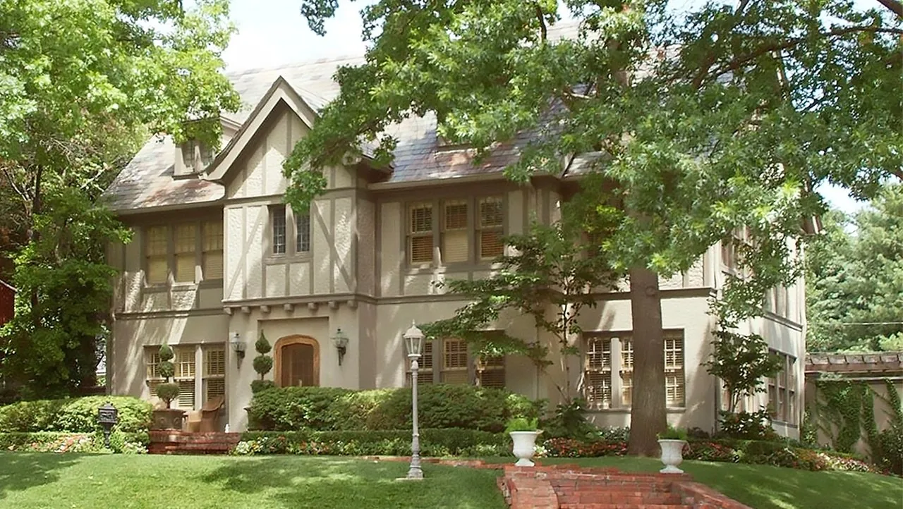 A Tudor front elevation in brick and stone